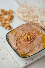 hummus made with chickpeas, walnuts and rosemary
