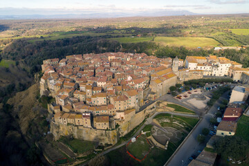 Aerial view of Farnese, A village in Viterbo, houses, roads and a landscape
