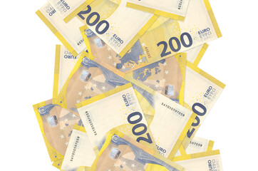 200 euro bills flying down isolated on white. Many banknotes falling with white copyspace on left...