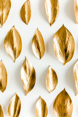 Pattern, texture with gold leaves isolated on white background. flat lay, top view