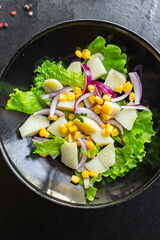 potato salad with corn lettuce and vegetables ready to eat on the table for healthy meal snack outdoor top view copy space for text food background image rustic keto or paleo diet