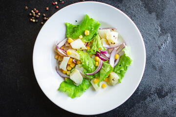 potato salad with corn lettuce and vegetables ready to eat on the table for healthy meal snack outdoor top view copy space for text food background image rustic keto or paleo diet