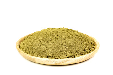 Close-up Moringa Powder in wooden plate isolated on white background.