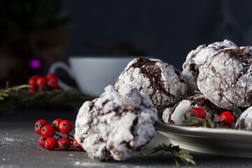 Home baked chocolate crinkle cookies in icing sugar. Cracked chocolate biscuits .
