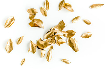 Pattern, texture with gold leaves isolated on white background. flat lay, top view