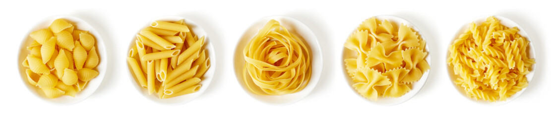 Pasta in bowl isolated on white, from above