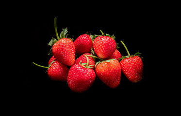 Fresh strawberries in dark background. vegan food background. healthy food concept