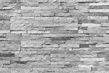 Natural facade stone decoration quartzite background texture. modern granite stone wall