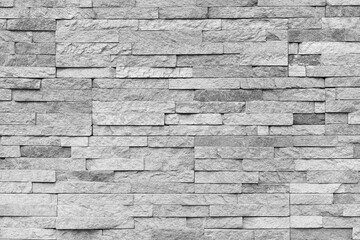 Natural facade stone decoration quartzite background texture. modern granite stone wall