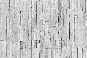 Natural facade stone decoration quartzite background texture. modern granite stone wall