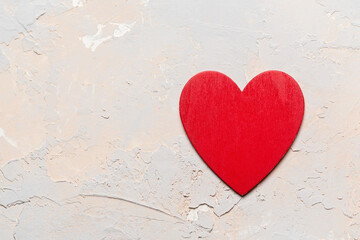 Big red painted heart on grey textured background, Saint Valentine day