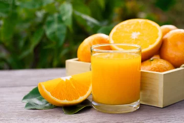 Schilderijen op glas orange juice and fruits © NIKCOA