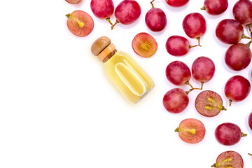 Grapes seed oil isolated on white background. Top view. Flat lay.