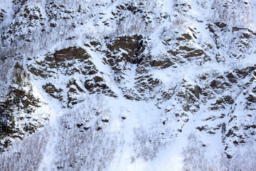 Obraz premium Magnificent view of the snow-white tall mighty mountains Elbrus, ski resort, the Republic of Kabardino-Balkaria, Russia