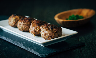 meatballs on plate on table