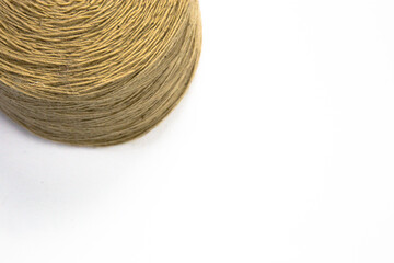 Wool in a ball on a white background, industrial wool for the production of carpets