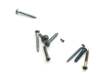 self-tapping screws and plugs for dowel on a white background for design