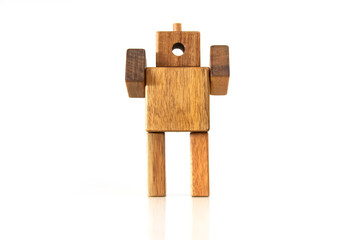 Hand made wooden robot craft on white background
