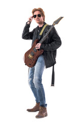 Naklejka premium Fashionable redhead handsome rock music guitarist posing holding sunglasses. Full body isolated on white background. 