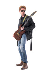 Naklejka premium Fashionable redhead handsome rocker with sunglasses posing with electric guitar. Full body isolated on white background. 