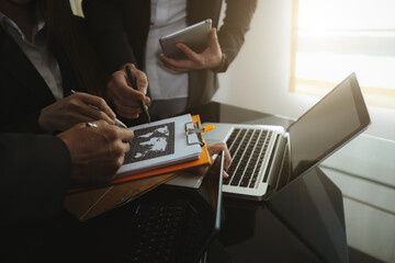 Team businessman working on laptop computer