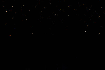 Beautiful golden bokeh on a black background