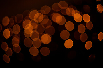 Beautiful golden bokeh on a black background