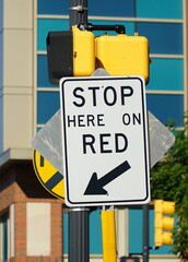 Stop here on RED traffic sign  