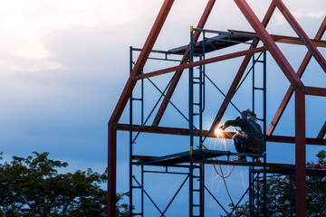 Welder working in work site.
