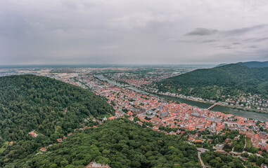 Aerial drone shot of Heidelberg from Konigstuhl hill in overcast summer morning