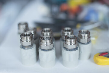 Combined couplings for connecting metal and polypropylene water pipes