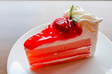 Strawberry cake on a white plate