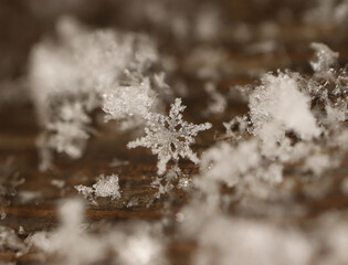 snowflake on a wooden background
