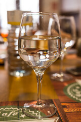 Beautiful stemmed glass or wine glass with fresh water in it.