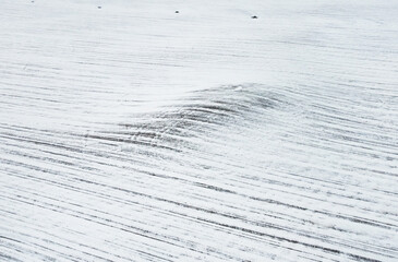 Winter landscape with texture of snowy empty field