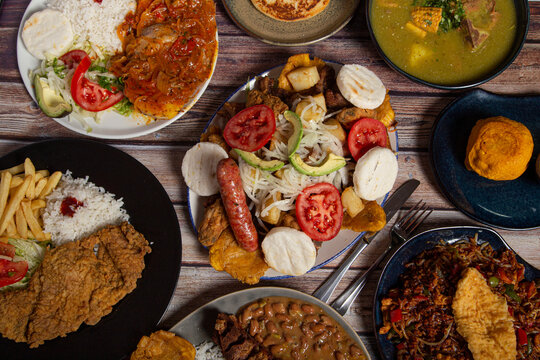 Variety of typical dishes of Colombian gastronomy. Picada, tripe, San cocho, paisa tray.