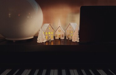 maquettes of small houses with christmas lights in amsterdam during corona lockdown covid 19