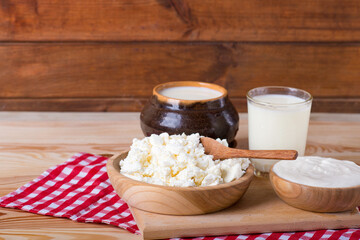 Fresh Cottage Cheese On Wooden Background, Close Up