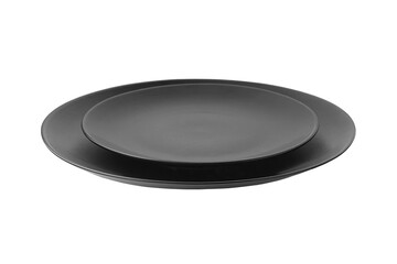Two empty black plates isolated on white background. Tableware. A set of plates.