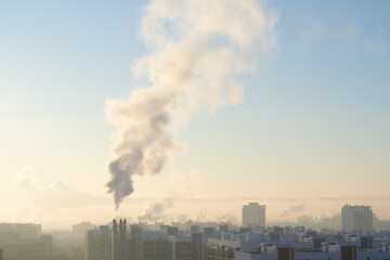 smoking chimney over the city