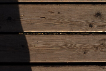 old fence boards on a sunny day

