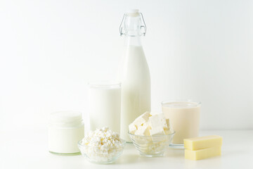 Fototapeta na wymiar Different milk products: milk, cheese and yoghurt 