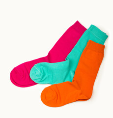 Colorful sock on the white background, top view