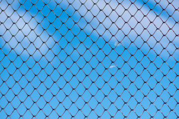 fence with blue sky