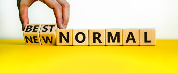 New best normal symbol. Hand turns cubes and changes words 'new normal' to 'best normal'. Business...