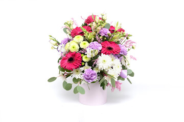 Bouquet of flowers in the box isolated on white background