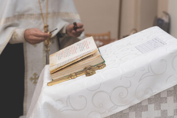 Lectern with Orthodox cross and Holy Gospel - 405880897
