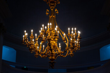A chandelier with many light bulbs.