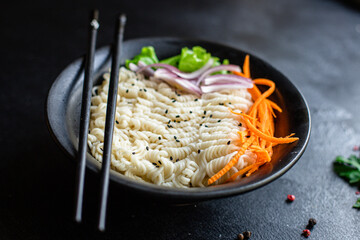 rice or wheat noodles cellophane pasta vegetables ready to eat on the table for healthy meal snack outdoor top view copy space for text food background image rustic