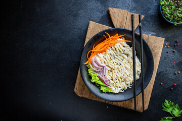 rice or wheat noodles cellophane pasta vegetables ready to eat on the table for healthy meal snack outdoor top view copy space for text food background image rustic